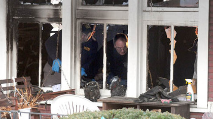 Investigators probe into the cause of the fatal fire Wednesday morning at 5737 Madison Road, Penn Hills, that claimed the life of a woman.
