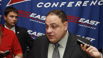 Big East football commissioner John Marinatto speaks with to reporters during the conference's media day, Tuesday in Newport, R.I.