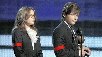Michael Jackson's children Paris, left, and Prince Michael Jackson II accept the Lifetime Achievement award on behalf of their late father at the Grammy Awards on Sunday in Los Angeles.