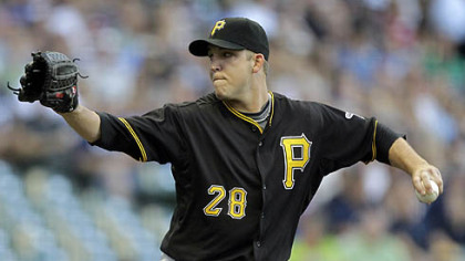 Pirates starting pitcher Paul Maholm throws during the first inning of Friday's game at Miller Park in Milwaukee.
