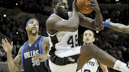 Spurs DeJuan Blair pulls down a rebound in front of the Mavericks' Drew Gooden Jan. 8 in San Antonio.