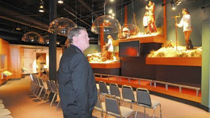 New Fort Pitt Museum director Alan Gutchess looks over displays on the second floor.