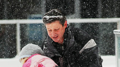 Rachel Grimsley, 6, of Fox Chapel, loses her balance on the ice rink at PPG Place on Monday. Rachel was ice skating with her father, Doug Grimsley.
