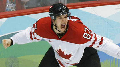 Sidney Crosby celebrates his overtime gold-medal goal against the U.S. Sunday.