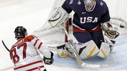 Sidney Crosby finds a hole through the pads of U.S. goaltender Ryan Miller for the overtime goal.