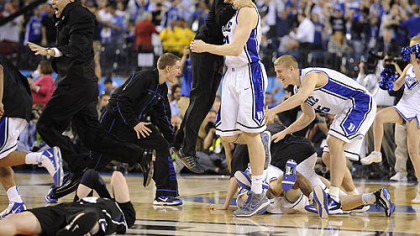 Duke players celebrate after defeating Butler.