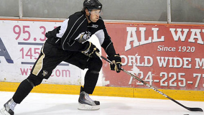 Penguins' forward Eric Tangradi works out during the team's development camp at Southpointe Tuesday.