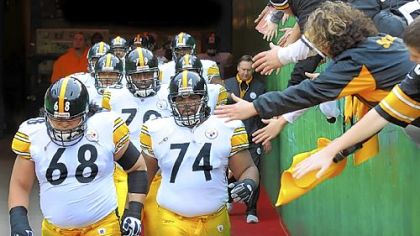 Willie Colon (74) heads past Steelers fans on his way to the field at Arrowhead Stadium in Kansas City last season.
