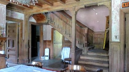 Paneled entrance hall and staircase of the B.F. Jones cottage in Cresson.
