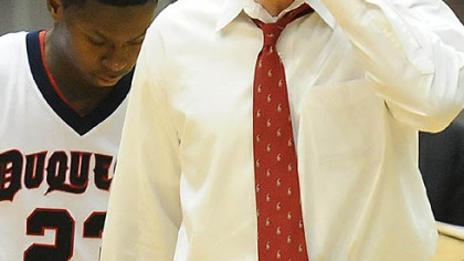 Duquesne head coach Ron Everhart reacts after losing to UMass in overtime.