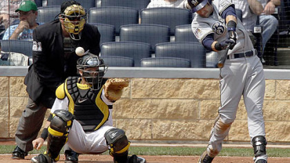 The Brewers' Ryan Braun doubles to right for two runs in the fifth innings, part of a five-RBI day.