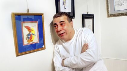 Tony Greco, of Brookline, with Woody Woodpecker at The Gallery on Baum.