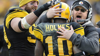 Brett Keisel and Steelers receivers coach Randy Fichtner greet Santonio Holmes after his touchdown catch against the Ravens Sunday. The Steelers likely will need another big day from the passing game to defeat Miami tomorrow.