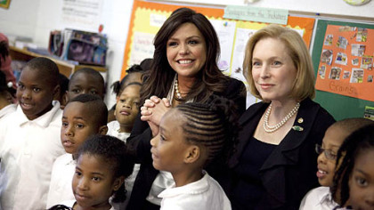 Television personality Rachael Ray, center, and Sen. Kirsten Gillibrand, D-N.Y., visit third-graders on Tuesday at Payne Elementary Schoolin Washington  to promote healthy eating.