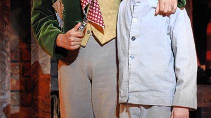 Mark Indelicato as the Artful Dodger, left, takes orphaned Oliver, played by Joseph Serafini, under his wing.