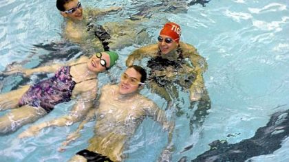 Four top WPIAL swimmers from left Mark Waugh and Jonathan Buerger of North Allegheny, Lindsay Vrooman of Ambridge and Zina Grogg of Moon.