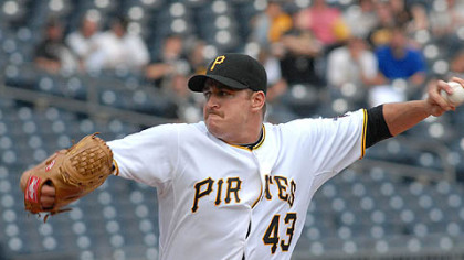 Pirates pitcher Jack Taschner throws.