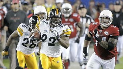 Pittsburgh Steelers linebacker James Harrison returns an interception for a 100-yard touchdown during the second quarter of Super Bowl XLIII, Sunday, Feb. 1, 2009, in Tampa, Fla.