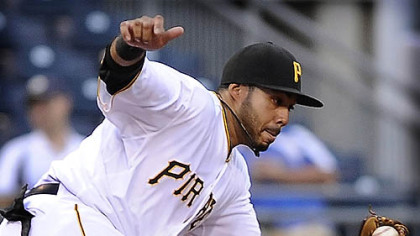 Pirates third baseman Pedro Alvarez makes play on ball hit by the Brewers Rickie Weeks.