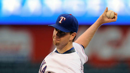 Rangers pitcher Scott Feldman throws during the second inning.