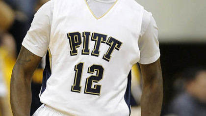 Pitt guard Ashton Gibbs yells after he put up a three-point shot at the end of regulation to send the game into overtime.