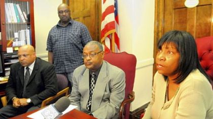 From left, Wilkinsburg police Detective Mike Adams, Mayor John Thompson, Wilkinsburg school Superintendent Archie Perrin and police Chief Ophelia Coleman speak about the Turner Elementary School third-grader who brought stamp bags of heroin to school on Tuesday.