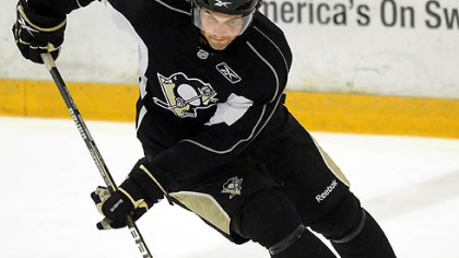 Penguins forward Eric Tangradi works out during the team''s development camp.