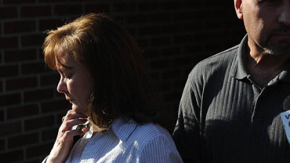 Jeannie Sanger, left, whose brother Benny Willingham was a miner killed in the West Virginia coal mine explosion, speaks with the media with her husband Bobby Sanger at Marsh Fork Elementary School.