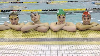 The four top WPIAL swimmers (from left) Mark Waugh, Jonathan Buerger, Lindsay Vrooman and Zina Grogg.