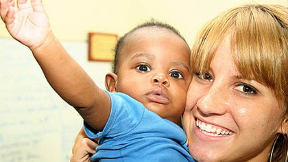 Alison McMutrie with a Haitian orphan last year.