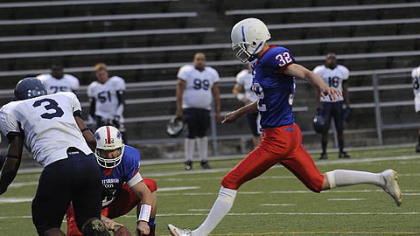 Pittsburgh Colts kicker Jeremy Hollin kicks for a field goal against the Lancaster Lightening at Ambridge Area High School July 31.