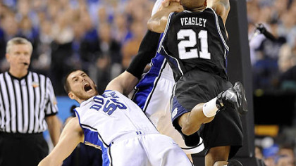 Butler's Willie Veasley drives to the net against Duke's Brian Zoubek in the first half.