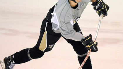 Forward Alex Smigelski works out during the Penguin's development camp.