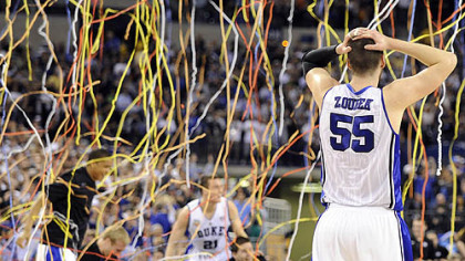Duke teammates celebrate after defeating Butler.