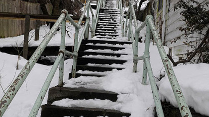 Steps in the South Side Slopes was snow covered Monday afternoon, going up from Leticoe and Eleanor Streets.