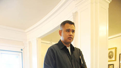 Cpl. Isaias Hernandez speaks about his wounded leg.
