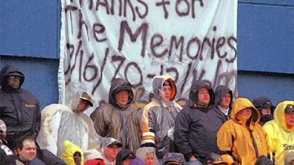 Pittsburgh Steelers fans brave a first-half downpour to watch the Steelers' final game at Three Rivers Stadium against the Washington Redskins Dec. 16, 2000, in Pittsburgh. The Steelers won 24-3.