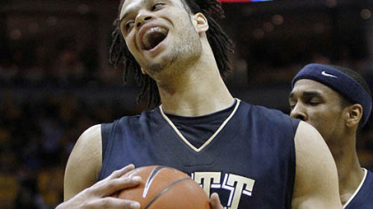 Pitt's Gary McGhee reacts after being called for a foul against Marquette's Jimmy Butler in the first half.