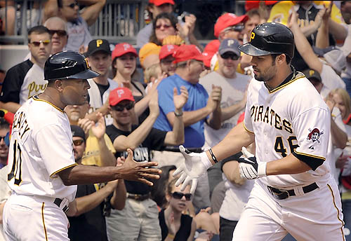 Pirates outfielder Garrett Jones walks away from the batter's box after