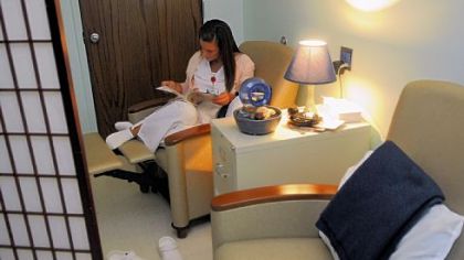 Registered nurse Noelle Kakuk takes a break in the "restoration room" from the medical surgical unit she works in Thursday at UPMC St. Margaret Hospital in Pittsburgh. The "restoration room" is place where nurses can take 15 minute breaks from their often busy and stressful job and decompress.
