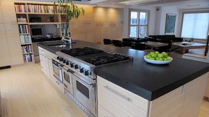 The kitchen is part of the first floor's open "flex" space that has room to seat up to 30 people for dinner.