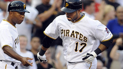The Pirates' Pedro Alvarez rounds third base after hitting his second home run in the second inning.