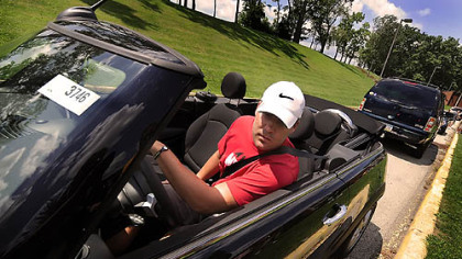 Steelers quarterback Ben Roethlisberger arrives at training camp at St. Vincent College in Latrobe in a Mini Cooper yesterday.