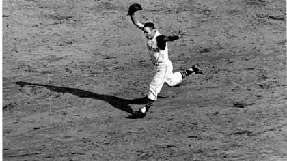 This 1960 photo of Bill Mazeroski rounding second base after his famous home run will serve as the model for the new PNC Park statue.