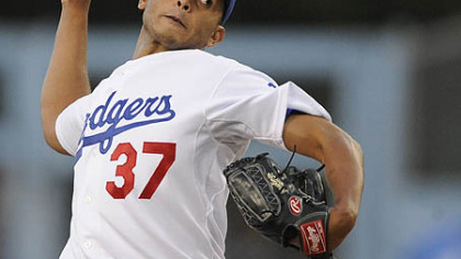 Dodgers starter Carlos Monasterios allowed one run on three hits and hit two batters