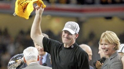 Steelers coach Bill Cowher and wife, Kaye, greet fans during a parade celebrating the team's victory in Super Bowl XL on Feb. 7, 2006.