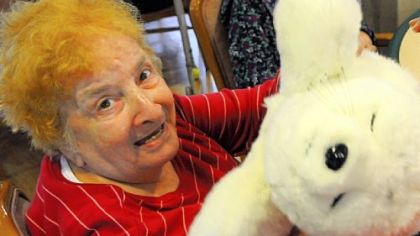 Anita Biro, of the Marian Manor in Green Tree, shows how her "baby seal" goes to sleep.