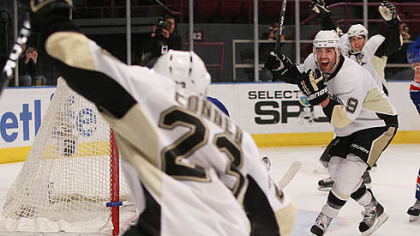 Penguins forward Chris Conner celebrates a goal with teammates Sidney Crosby, rear, and Pascal Dupuis during a game against the Rangers at Madison Square Garden in New York in January. The Penguins won, 4-2.