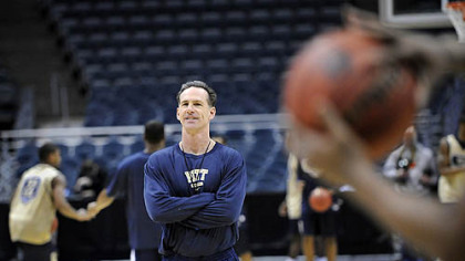 Pitt head coach Jamie Dixon watches as his team practices at the Bradley Center in Milwaukee, during the early rounds of the NCAA Tournament.