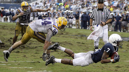 Penn State wide receiver Curtis Drake hauls in a pass in front of LSU linebacker Jacob Cutrera.